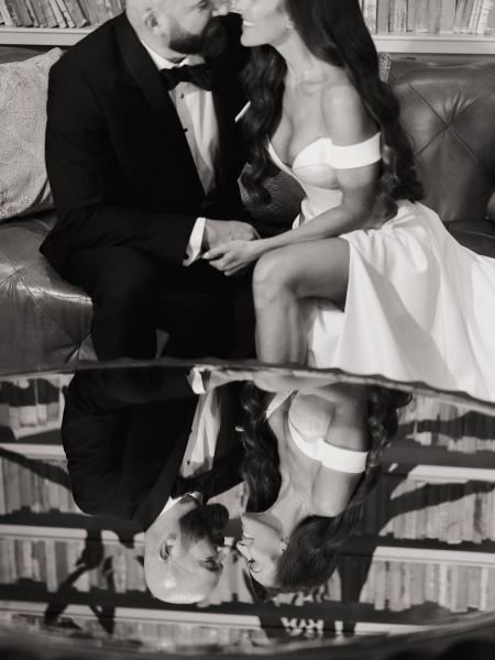 Close-up of bride leaning on groom’s shoulder in hotel lobby at The Ben Autograph Collection Hotel Palm Beach