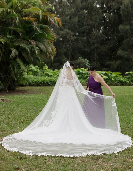 Bride posing with gown flowing at Spanish Monastery Miami