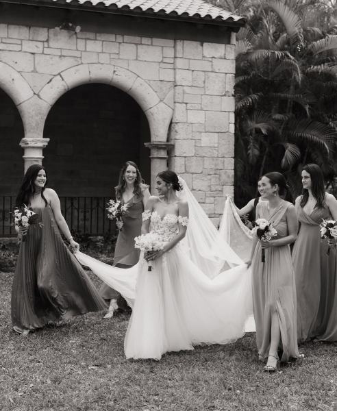 Bridesmaids posing with bride at Spanish Monastery Miami