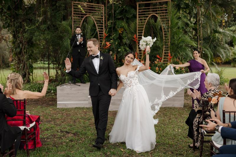 Romantic first kiss during ceremony at Spanish Monastery Miami