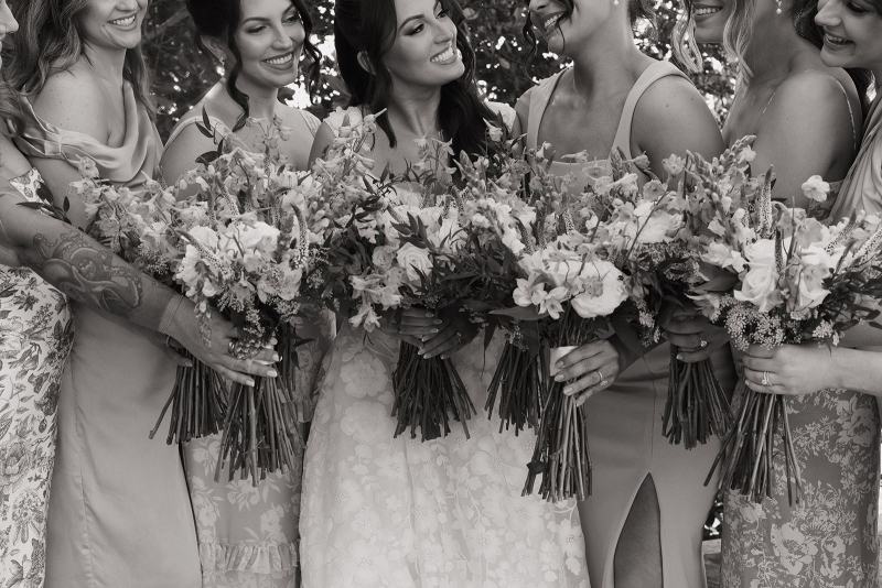 Candid of bridesmaids laughing at Islamorada Fish Company Florida Keys
