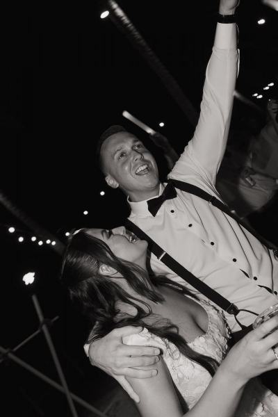 Guests cheering during cake cutting at Islamorada Fish Company Florida Keys