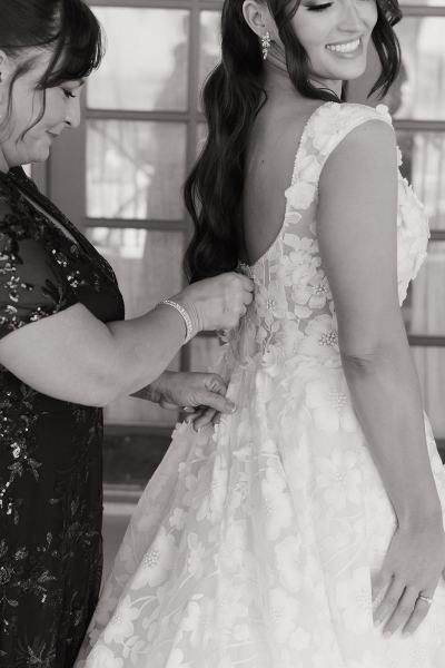 Bridesmaids helping bride prepare at Islamorada Fish Company Florida Keys