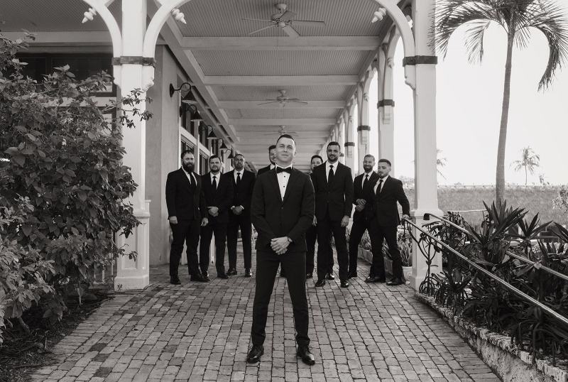 Candid of groomsmen laughing at Islamorada Fish Company Florida Keys