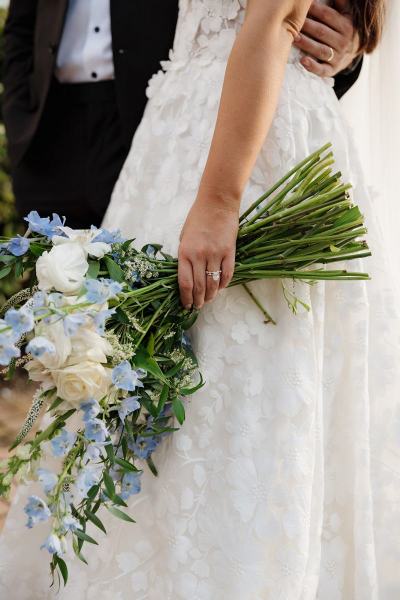 Bride holding bouquet while posing at Islamorada Fish Company Florida Keys