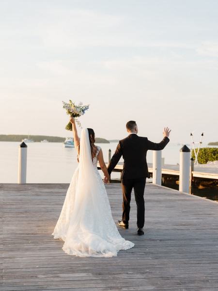Couple walking hand-in-hand at Islamorada Fish Company Florida Keys