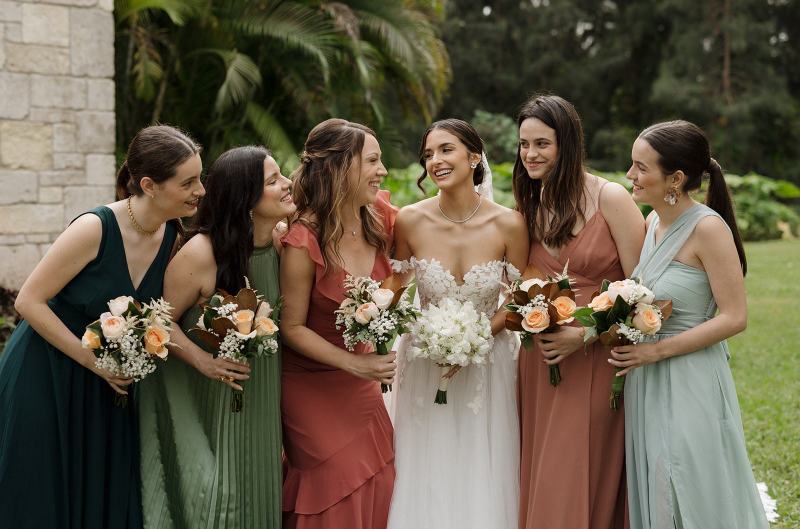 Candid of bridesmaids laughing at Spanish Monastery Miami