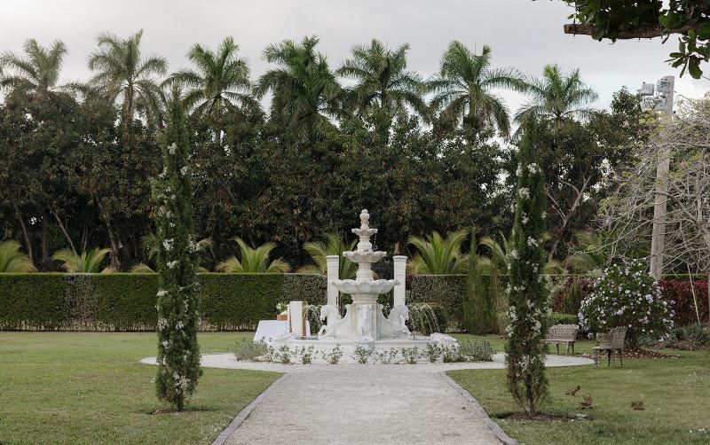 Wide shot of Cinco Farms Miami ceremony setup with chairs and aisle