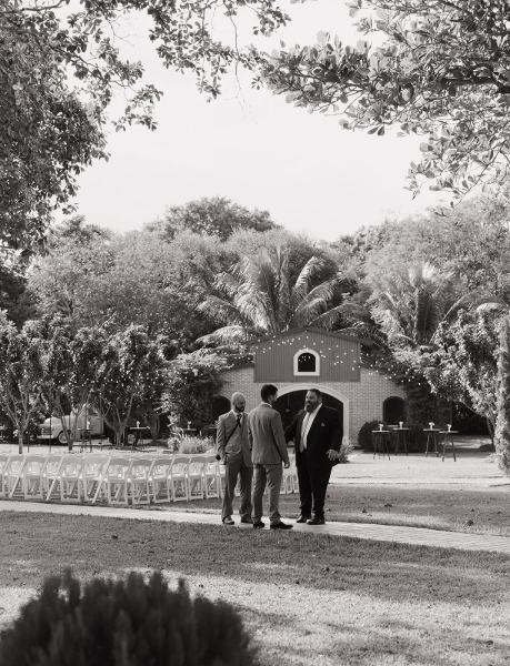 Guests chatting before the ceremony at Cinco Farms Miami wedding