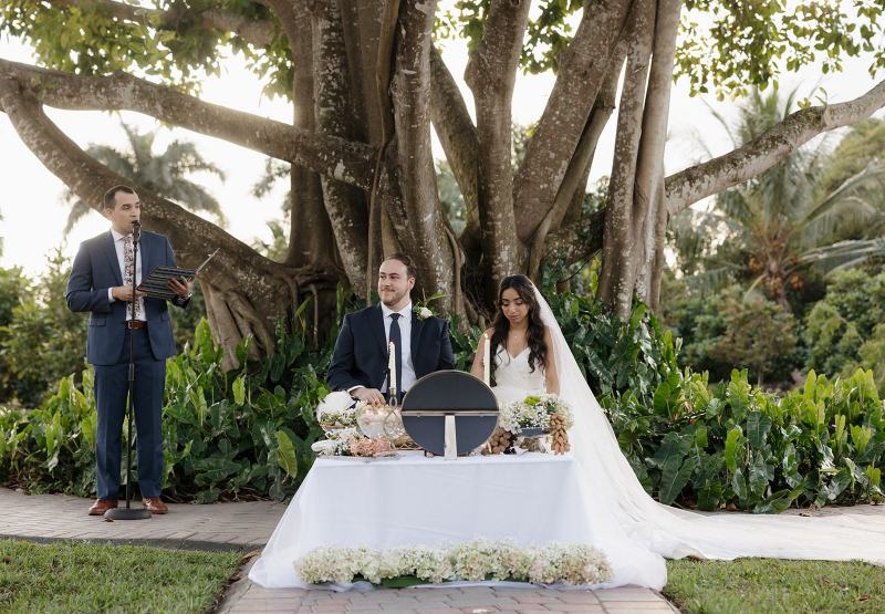 Groomsmen waiting at altar at Cinco Farms Miami wedding