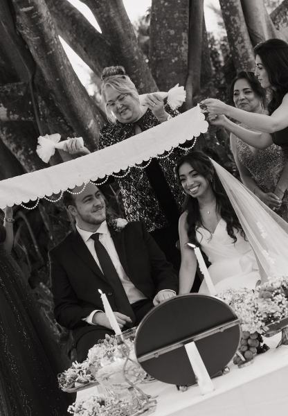 Couple holding hands at Cinco Farms Miami wedding-2
