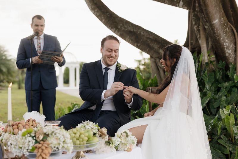 Bride adjusting veil at Cinco Farms Miami wedding