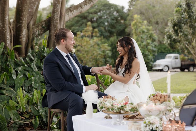 Close-up of wedding rings during ceremony at Cinco Farms Miami
