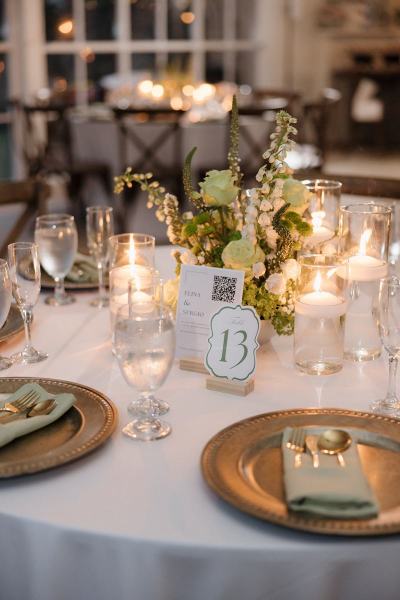 Centerpiece candles on tables at Cinco Farms Miami wedding