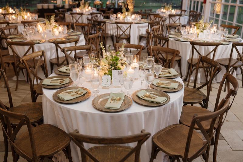 Centerpiece candles on tables at Cinco Farms Miami wedding