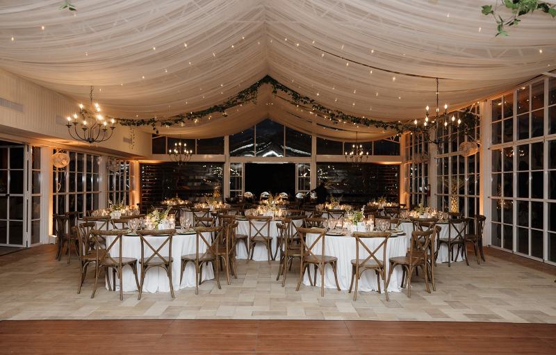Romantic candle arrangement with flowers at Cinco Farms Miami reception