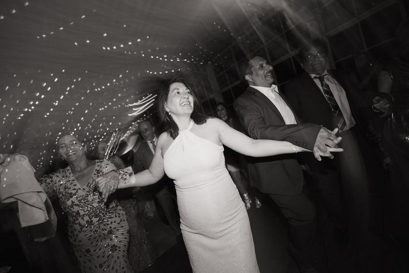 Bride and groom dancing with guests at Cinco Farms Miami reception