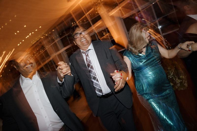Groom dancing with groomsmen at Cinco Farms Miami wedding