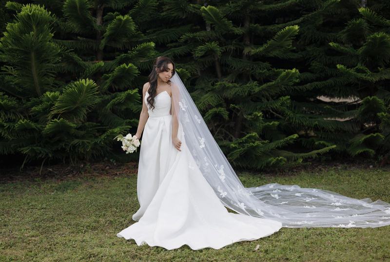 Bride posing in wedding dress at Cinco Farms Miami