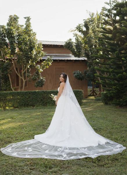 Bride standing with bouquet at Cinco Farms Miami wedding