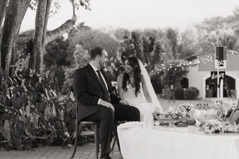 Groom smiling during Cinco Farms Miami wedding vows