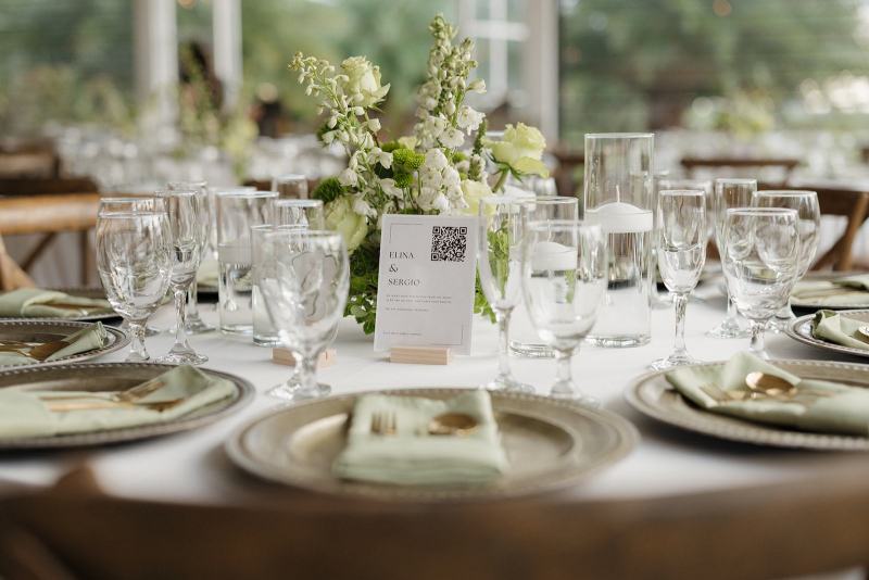 Table settings with plates, glasses, and cutlery at Cinco Farms Miami