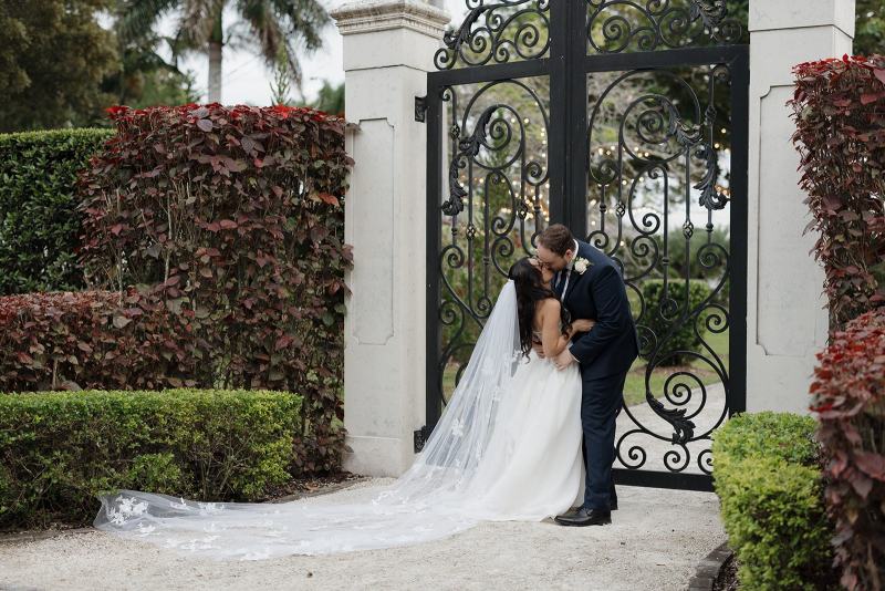 Bride looking at groom in garden at Cinco Farms Miami