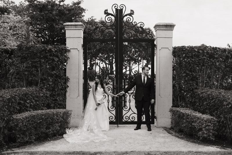 Groom laughing with bride at Cinco Farms Miami wedding portraits
