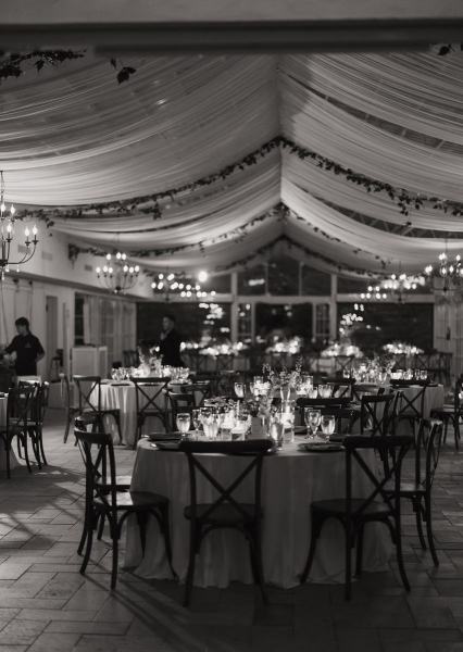 Candlelit centerpieces on reception tables at Cinco Farms Miami