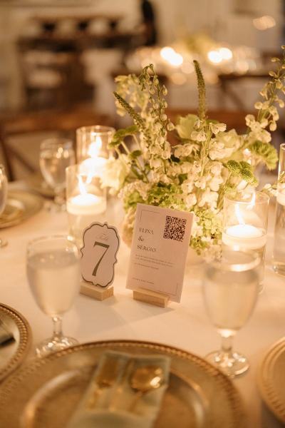 Romantic candle arrangement with flowers at Cinco Farms Miami reception