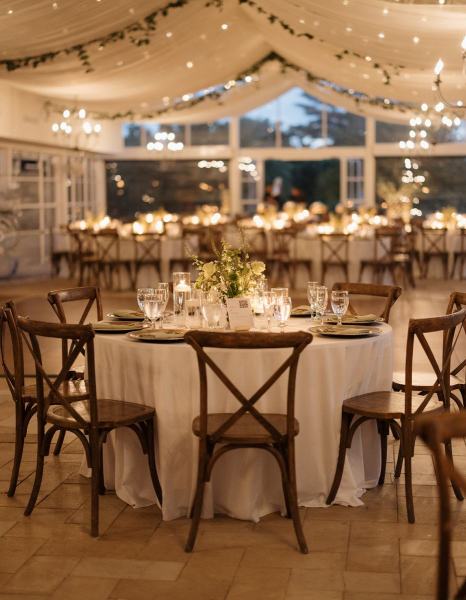 Romantic candle arrangement with flowers at Cinco Farms Miami reception
